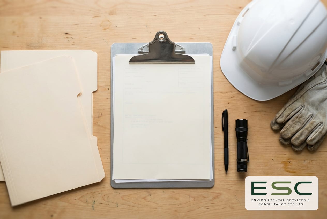 ESC site-inspection paperwork and equipment: clipboard, report folders, hard hat and gloves